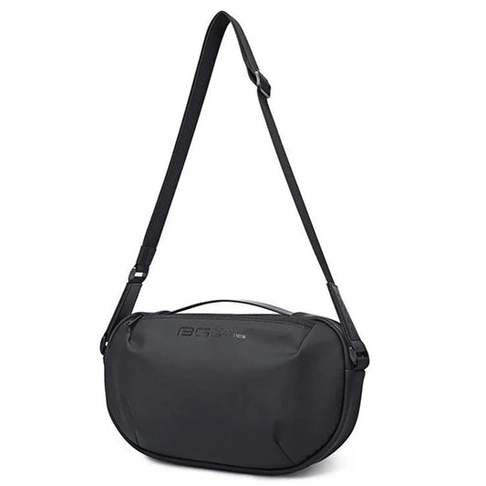 Front view of the BANGE BG-7308 anti-theft crossbody shoulder bag with adjustable strap, compact curved design, smooth fabric finish, and subtle BANGE branding on a white background