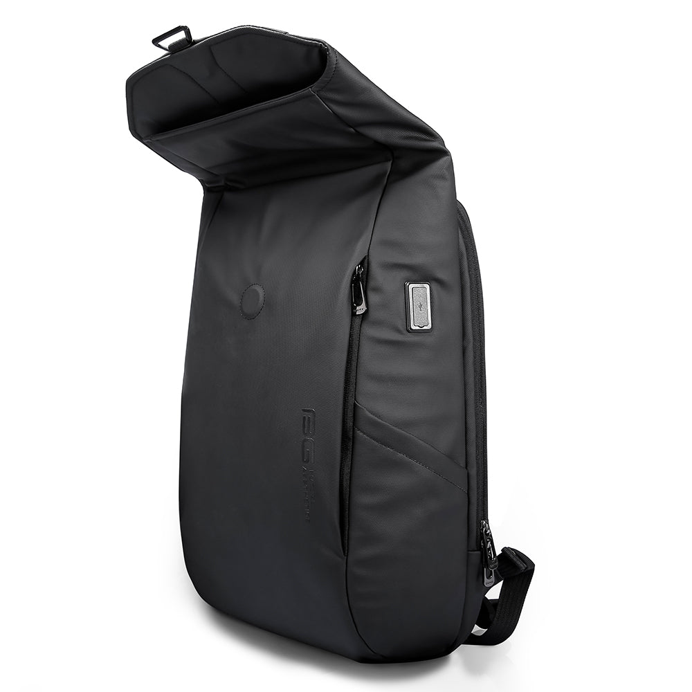 Black BANGE backpack with open flap top, USB port, and minimalist water-resistant exterior.