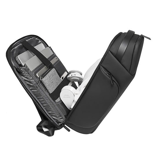 Bange 7277 Black backpack open to reveal organized interior, featuring compartments holding laptops