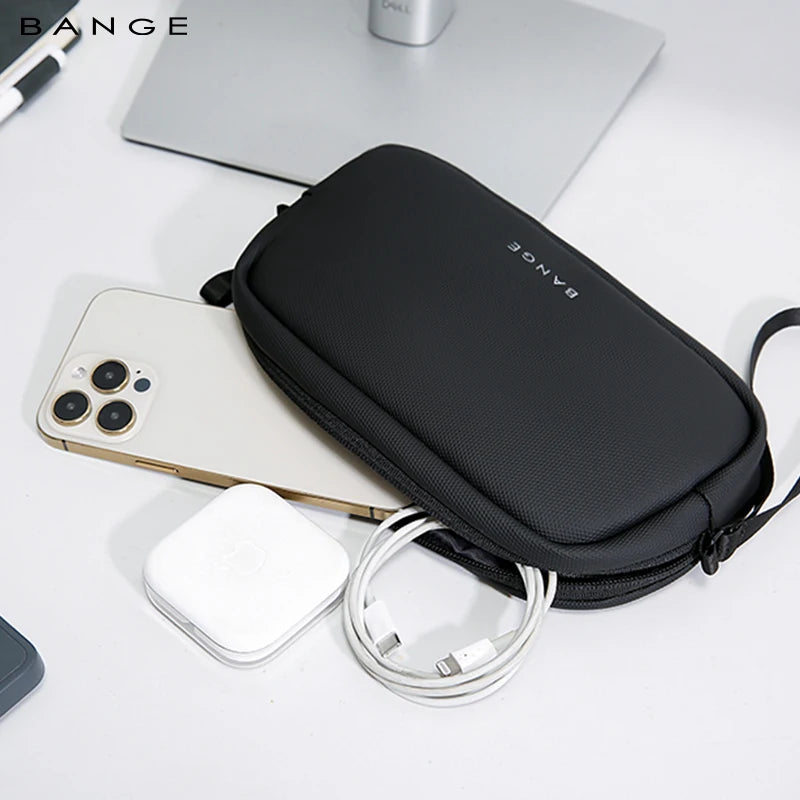 BANGE 3066 cable organizer pouch on a desk beside a phone, charger and cable