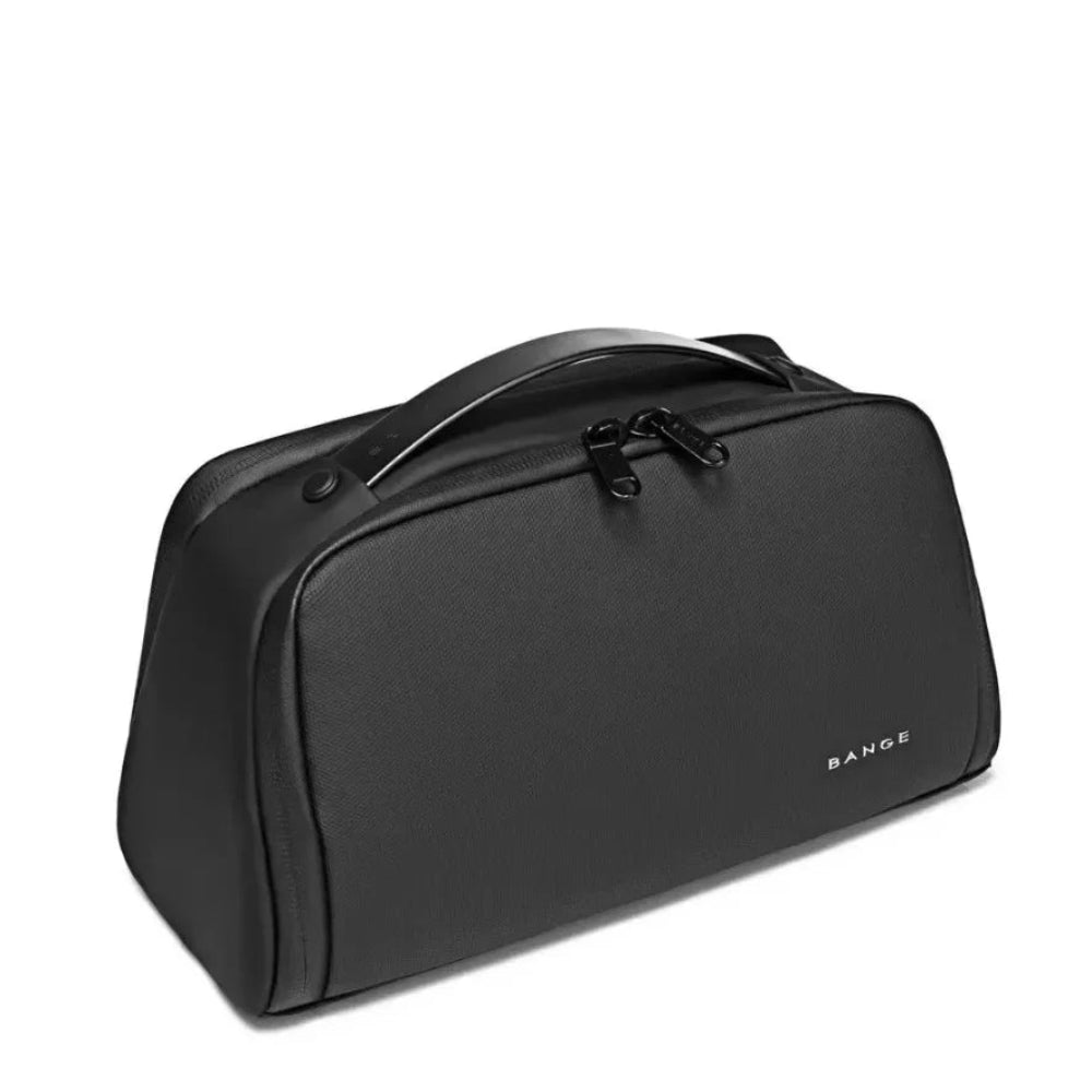 Angled view of black BANGE BG-22196 toiletry bag with structured design, top handle, and zippered main compartment