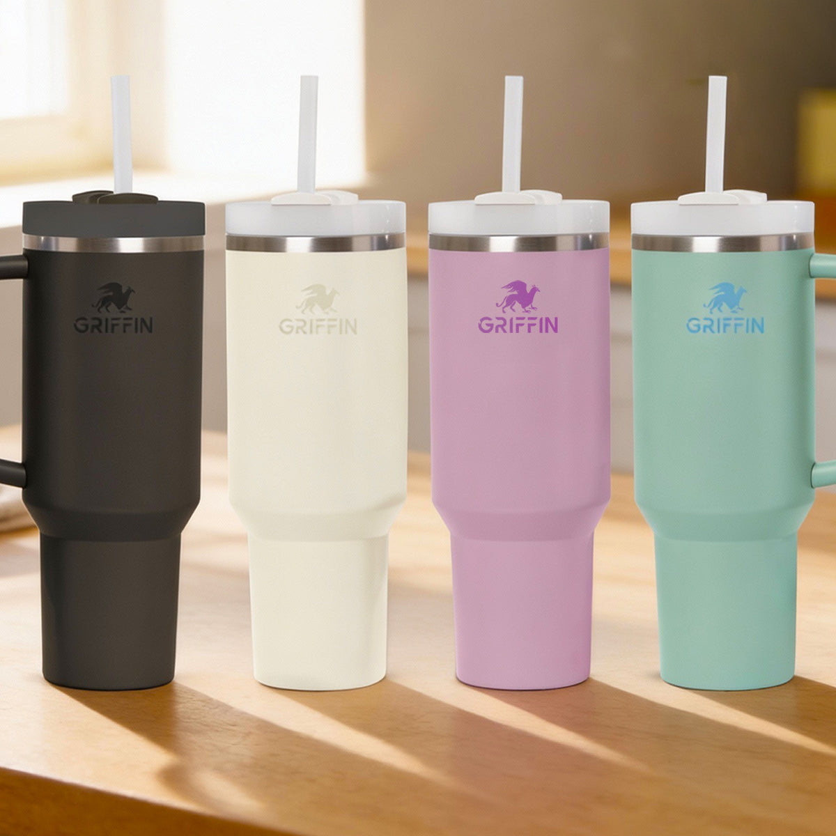 Griffin tumblers in black, cream, orchid and eucalyptus side by side